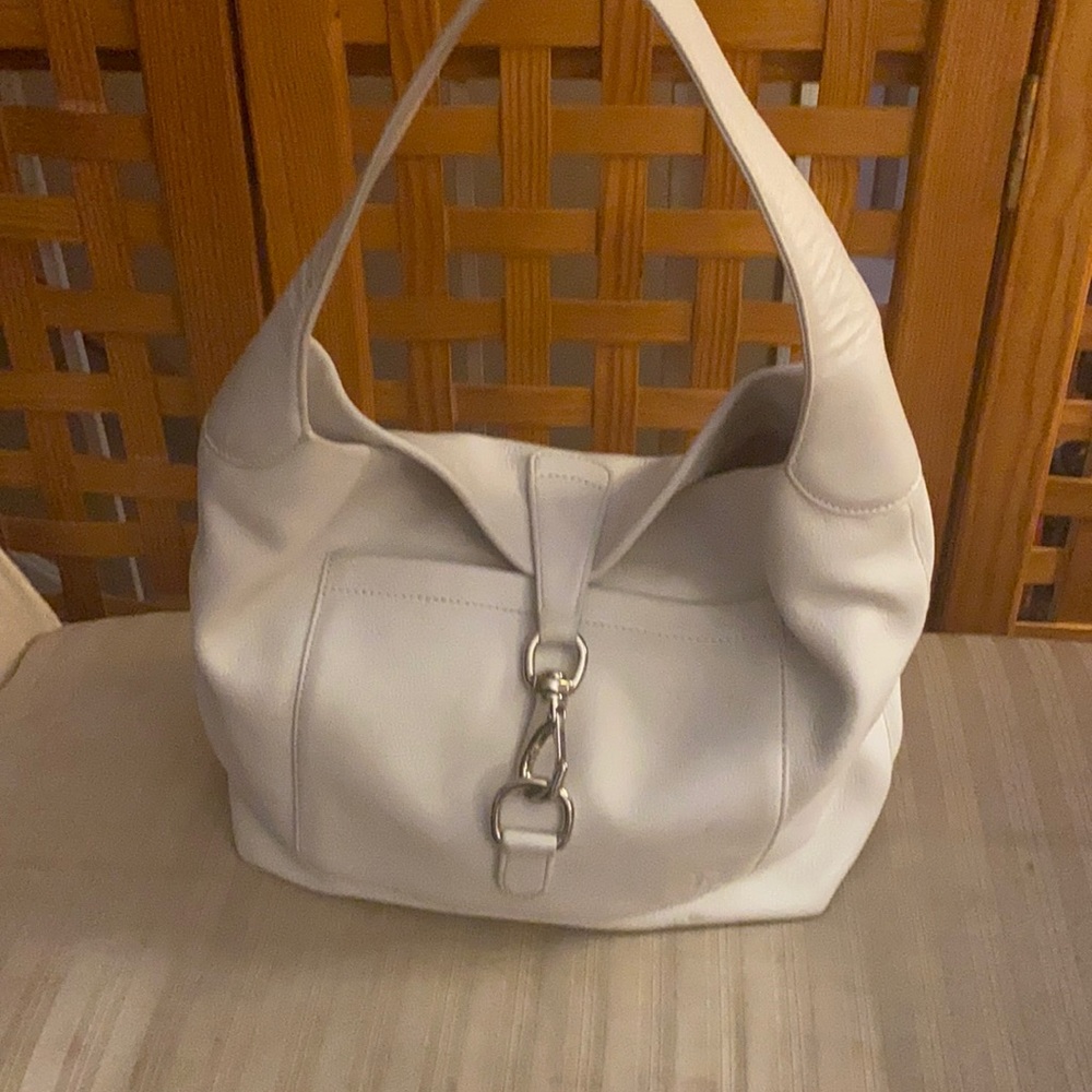 White leather bag.